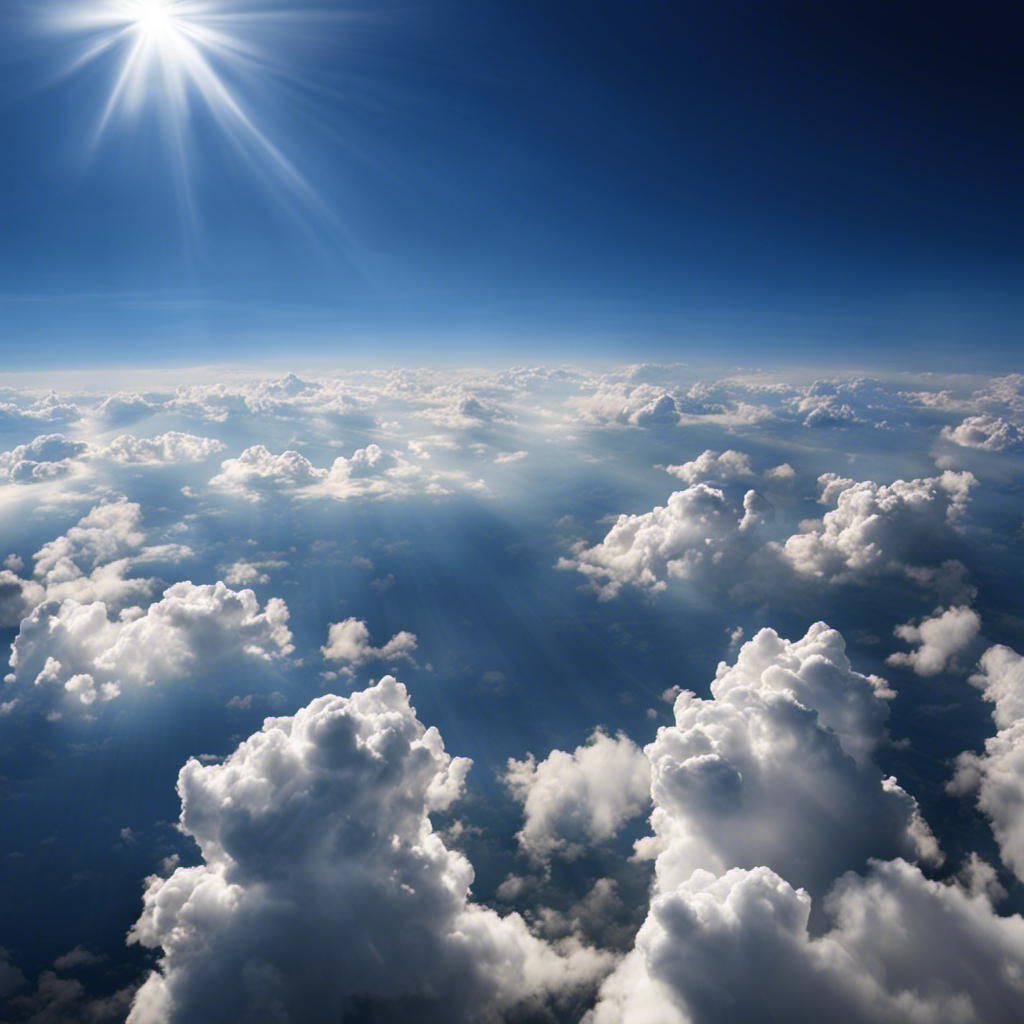 An image showcasing a vast blue sky with fluffy white cumulus clouds, illuminated by the sun